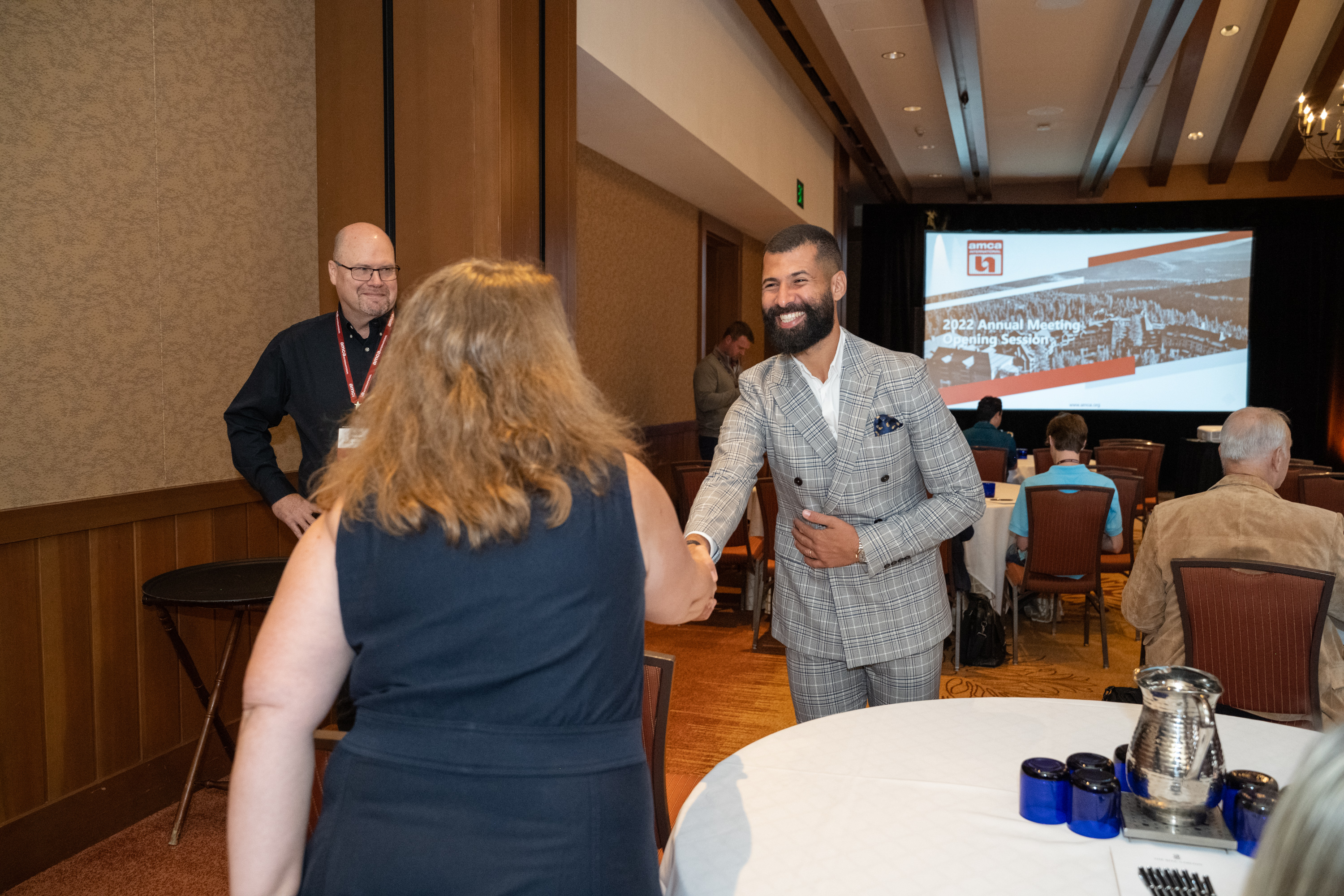 AMCA Europe and Middle East Director Hassan Abou Jawhar greets an attendee at the 2022 AMCA Annual Meeting.